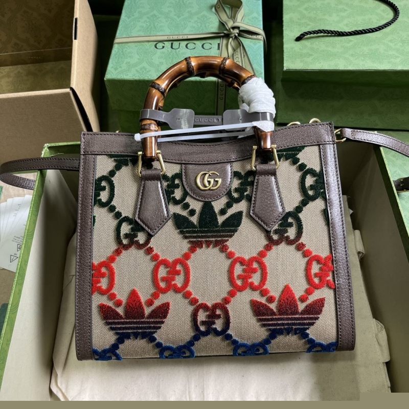 G*u*i top handle bags